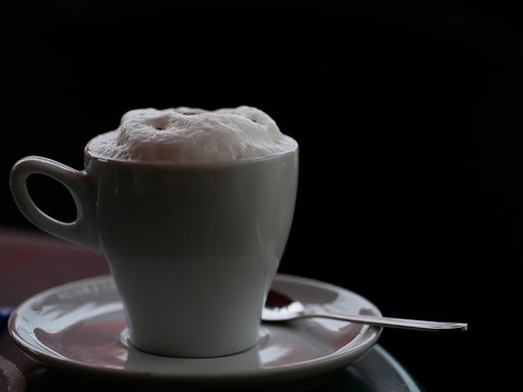 White cup of cappuccino