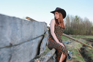 cowgirl un hat with guitar
