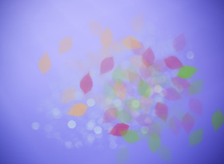 Autumn leaves and light blue purple bokeh blurred background/Autumn leaves and light blue purple bokeh blurred background