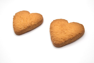 Two cookies in the form of hearts - symbol of love