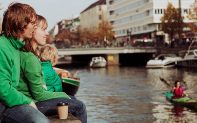 tourist family on the quay of Denmark, travel Europe