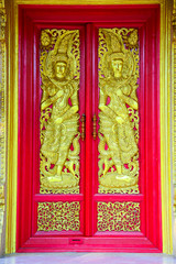 Obraz premium Buddhist church doors with Thai traditional art.