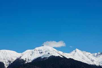 Fototapeta na wymiar white snow mountain and blue sky