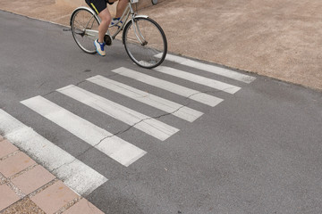 Fototapeta premium crosswalk symbol with Cyclists In the park..