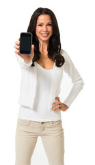 Fototapeta premium Pretty casually dressed young female woman girl holding showing mobile phone isolated on white background