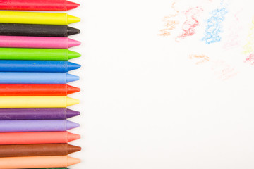 Crayons and paper on the desk