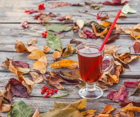 Autumn mulled wine and  fall leaves