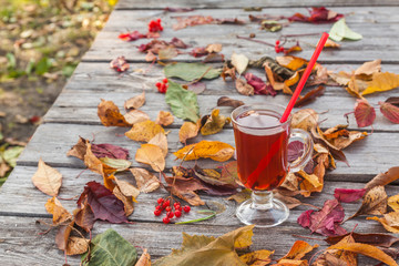 Autumn mulled wine and  fall leaves