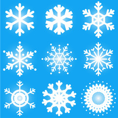 Set of white snow flake on blue background for decoration in Chr