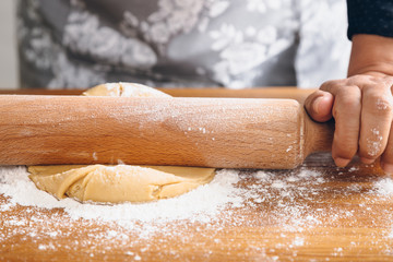 Making dough with rolling pin