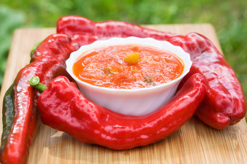 Hot peppers in tomato sauce with herbs and garlic
