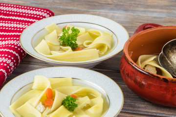 Fresh homemade chicken soup with noodles.