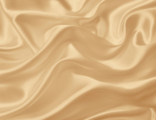 Smooth elegant golden silk or satin texture as background. In Se