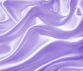 Smooth elegant lilac silk or satin texture as background