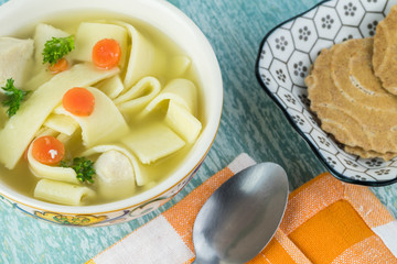 Fresh homemade chicken soup with noodles.