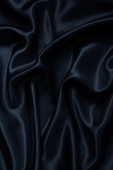 Smooth elegant black silk as background