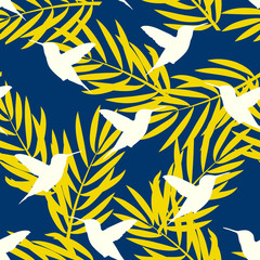 Seamless pattern with palm sheets and hummingbird. Vector background