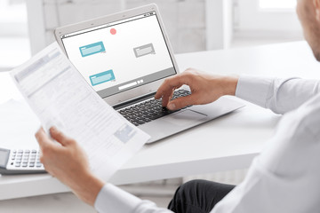 businessman with laptop computer working at office