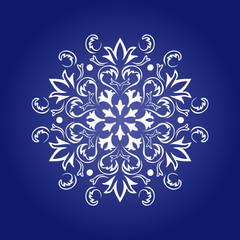 Die cut paper card with cutout mandala ornament.
