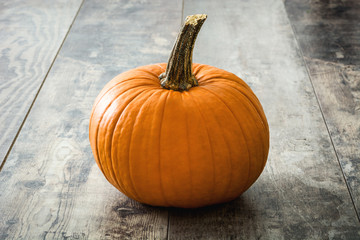 Pumpkin on rustic wooden table

