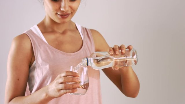 Young woman drinking  water