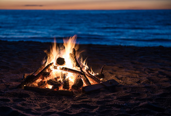 Beach Bonfire on the Lake at Sunset