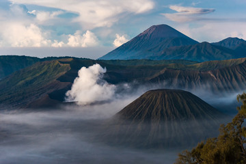Fototapeta na wymiar Mount Bromo volcano at morning, the steaming crater of Mount Bro