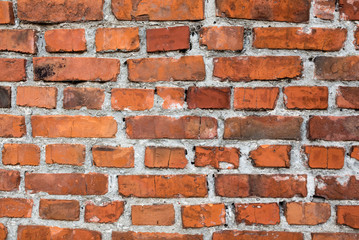 Brick wall sealed with concrete