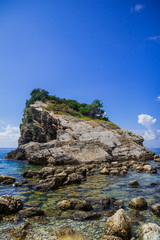 Fototapeta na wymiar Stone island in the sea