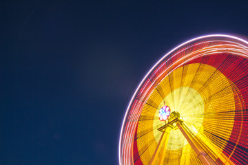 Ferris wheel at slow shutter speeds with gorgeous lights