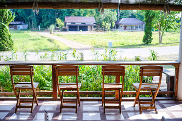 chairs and counter on sunny at cafe