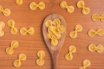 Farfalle into a spoon