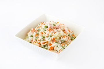 Russian salad isolated on white background

