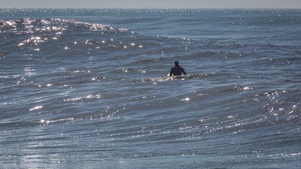 One in the ocean. Surfing in Costa da Caparica, Portugal