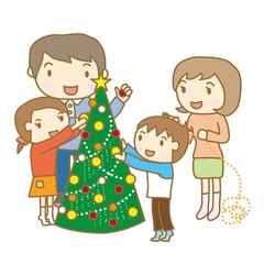 クリスマスツリーの飾りつけをする家族