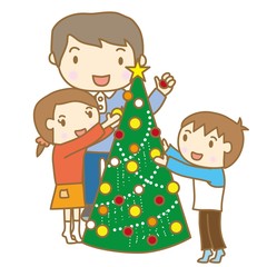 クリスマスツリーの飾りつけをする家族

