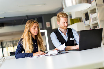 Young couple in the office