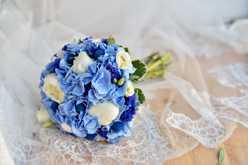 Beautiful wedding colorful bouquet for bride. Beauty of colored flowers. Close-up bunch of florets. Bridal accessories. Female decoration for girl. Details for marriage and for married couple