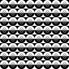 Fun pattern with white and black circular shapes
