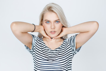 Fototapeta premium female model with blond hair posing in studio