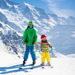 Children skiing in the mountains