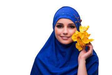 Arabian woman with orchid flower isolated on white