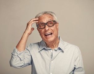 Thinking elderly man.