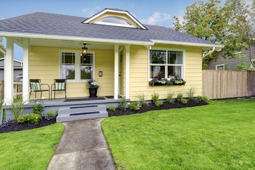 Small American yellow house exterior
