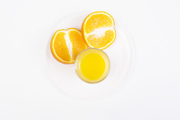 Orange halves and juice