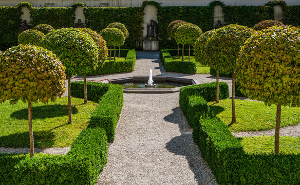 Formal manicured public garden with topiary