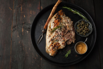 Delicious grilled pork with spices and mustard