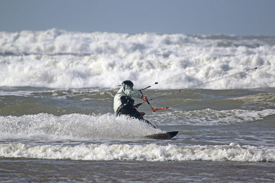 kitesurfer in waves