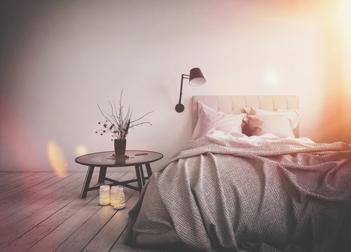 Bright warm sun flare in a messy bedroom