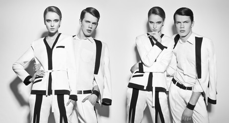 Fashion couple in white suite